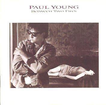 CD - Paul Young - Between Two Fires